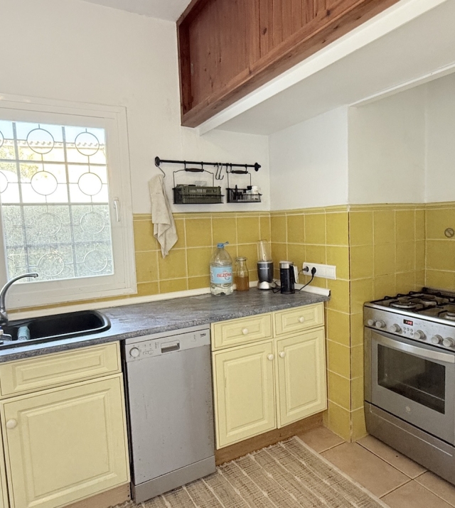 Resa estates ibiza for sale te koop villa huis zwembad san jose kitchen 3.jpeg